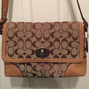 Coach logo signature fabric bag.